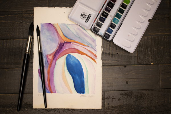 Georgia O'Keeffe Styled Foot-Painting beside painter's pallet
